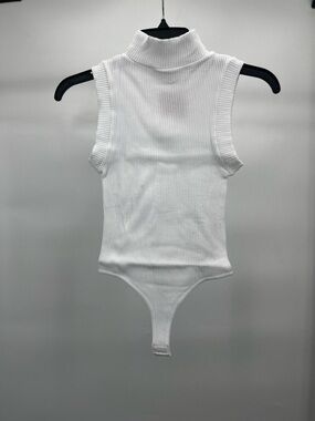 Women’s Dynamic Sleeveless Ribbed Turtleneck Bodysuit in White Clasps at Bottom